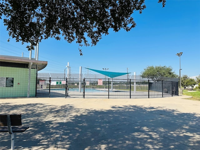 view of property's community featuring a pool