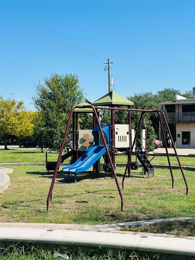 view of playground featuring a lawn