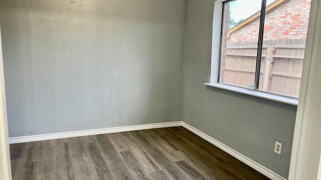 empty room with wood-type flooring