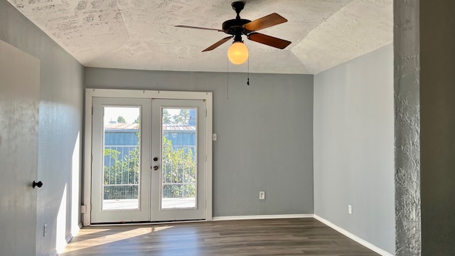 entryway with french doors, hardwood / wood-style flooring, lofted ceiling, and ceiling fan