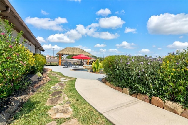 view of yard featuring a gazebo and a patio area