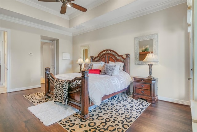 bedroom with ceiling fan, crown molding, and dark hardwood / wood-style flooring