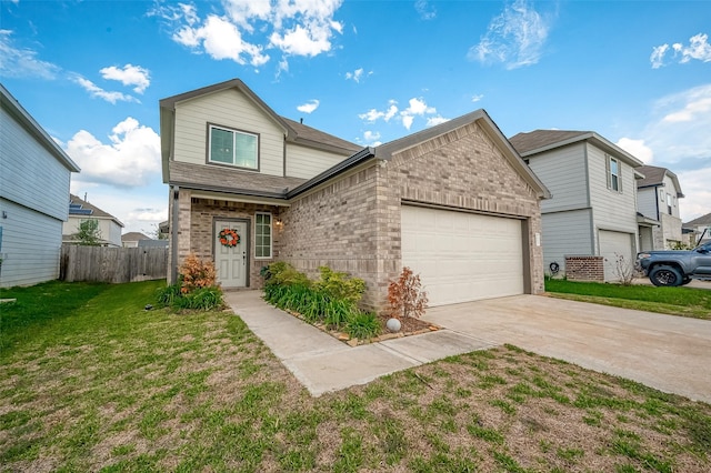 view of front of property featuring a front yard and a garage