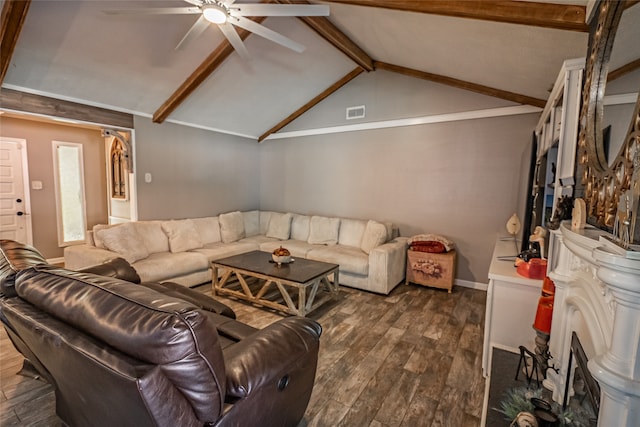 living room featuring ceiling fan, dark hardwood / wood-style floors, and lofted ceiling with beams