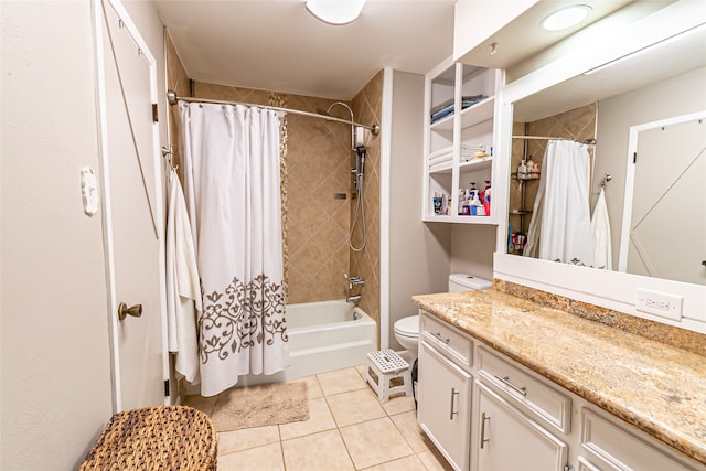 full bathroom featuring vanity, shower / tub combo with curtain, tile patterned floors, and toilet