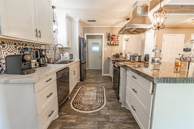 kitchen featuring island range hood, crown molding, white cabinetry, appliances with stainless steel finishes, and hanging light fixtures