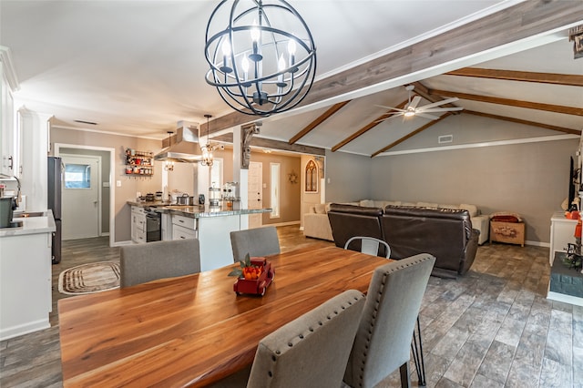 dining room with lofted ceiling with beams, ceiling fan with notable chandelier, and dark hardwood / wood-style floors