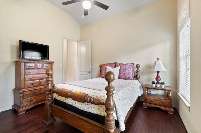 bedroom with multiple windows, lofted ceiling, dark hardwood / wood-style floors, and ceiling fan