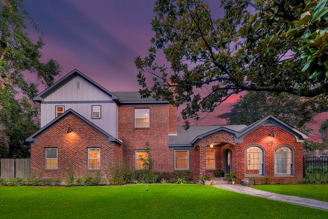 view of front property with a lawn