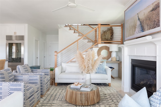 living room featuring wine cooler and ceiling fan