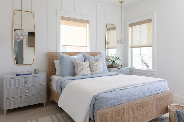 bedroom with hardwood / wood-style flooring