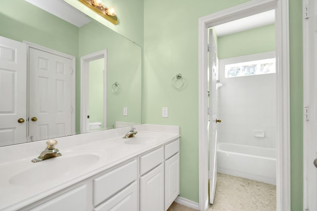 full bathroom featuring toilet, vanity, and shower / bathing tub combination