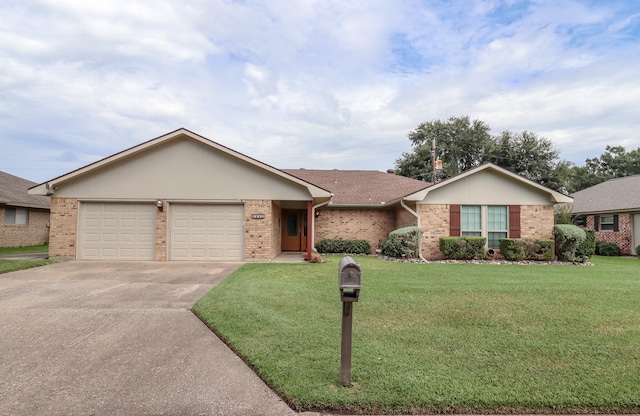 ranch-style house with a front yard and a garage