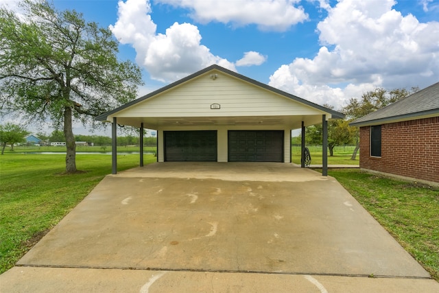 garage with a yard