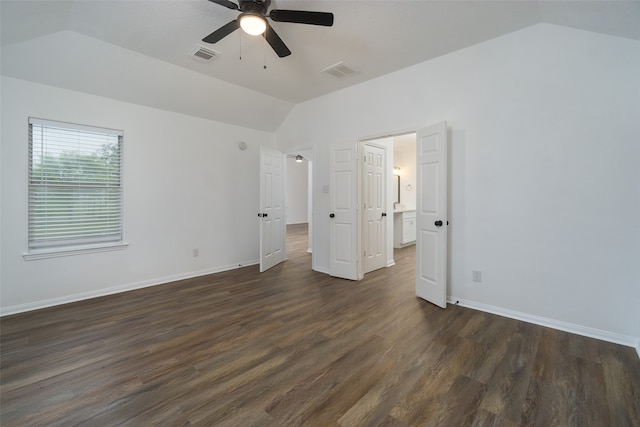 interior space featuring lofted ceiling, dark hardwood / wood-style floors, and ceiling fan