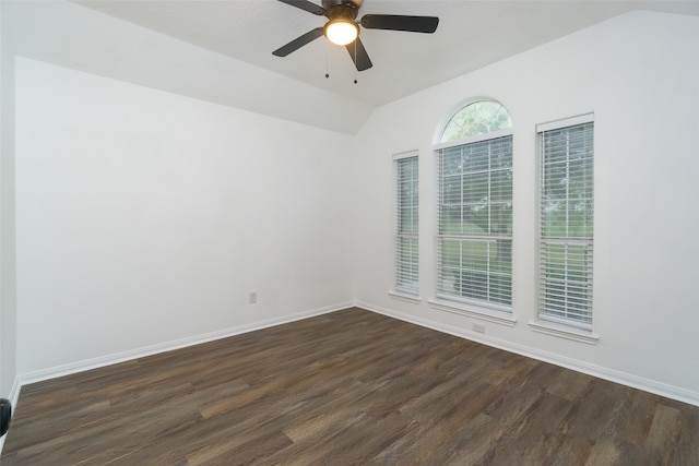 spare room featuring lofted ceiling, ceiling fan, and dark hardwood / wood-style floors