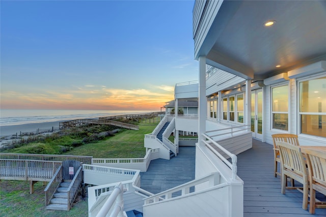 deck at dusk with a water view