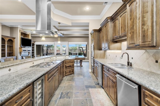 kitchen with beverage cooler, sink, ornamental molding, appliances with stainless steel finishes, and island exhaust hood