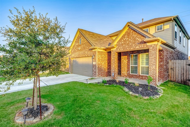 view of front of property featuring a garage and a front lawn