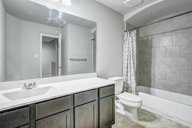 full bathroom with vanity, toilet, and shower / tub combo with curtain