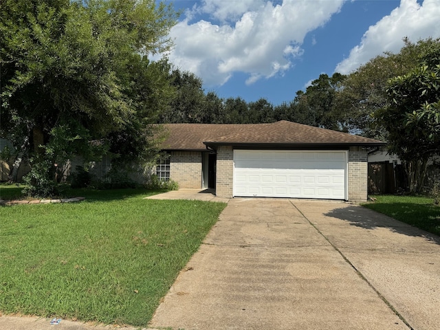 single story home featuring a front yard and a garage