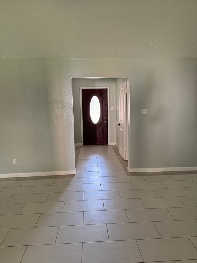 view of tiled foyer entrance