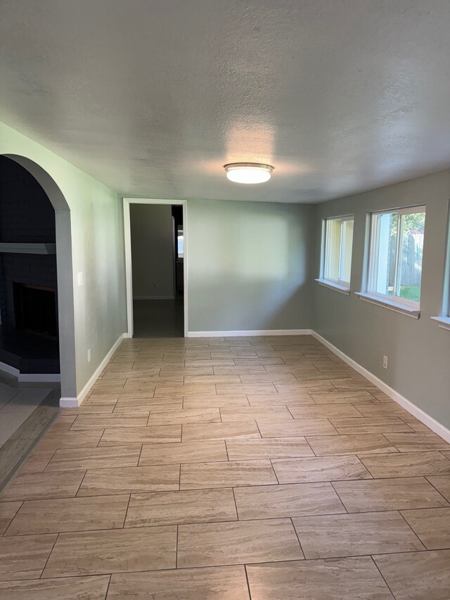 spare room featuring a textured ceiling