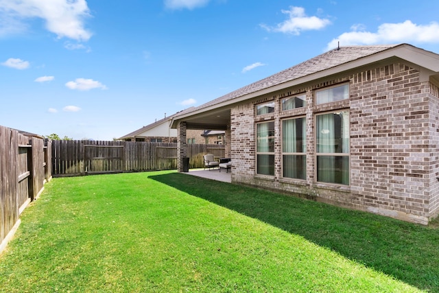 view of yard with a patio area