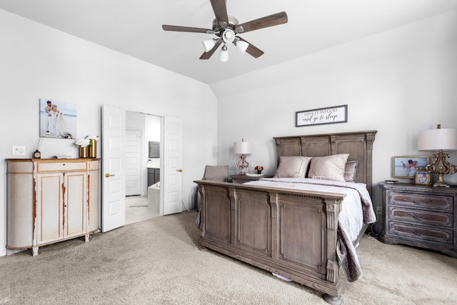 bedroom with ceiling fan, light colored carpet, and lofted ceiling