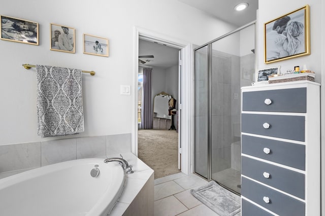 bathroom featuring shower with separate bathtub, tile patterned floors, and vanity