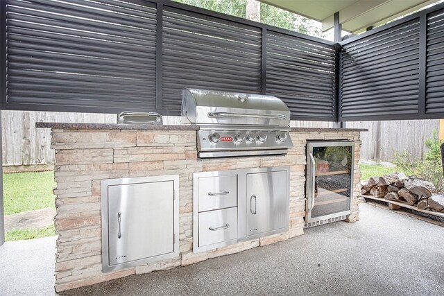 view of patio / terrace with grilling area and exterior kitchen