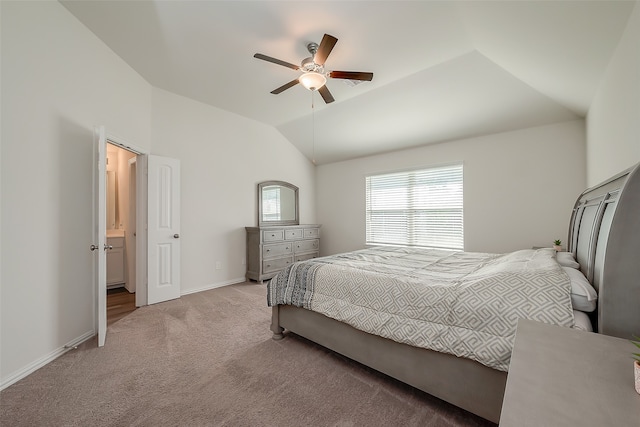 bedroom featuring vaulted ceiling, light carpet, and ceiling fan