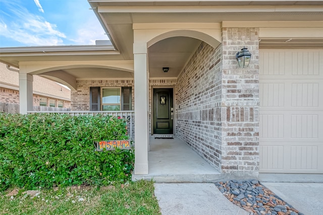 property entrance with a garage