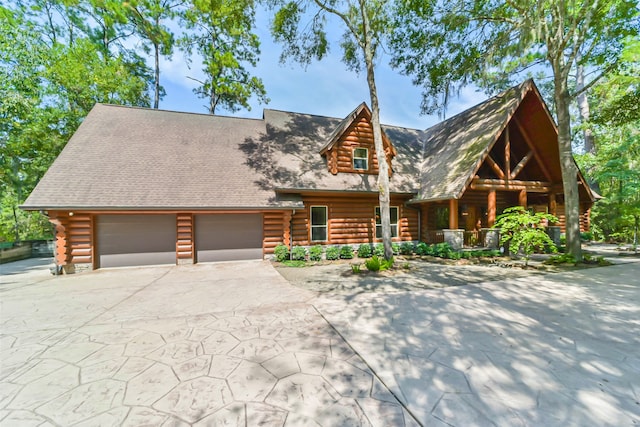 log home with a garage