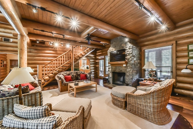 living room featuring wood ceiling and rustic walls