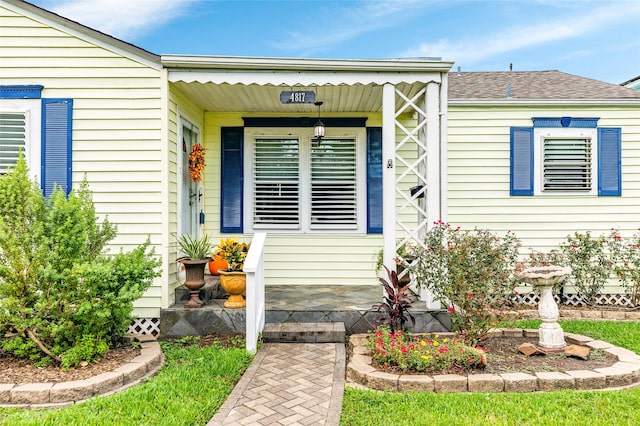 entrance to property with a porch