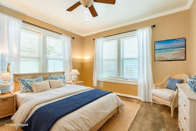 carpeted bedroom with ceiling fan and ornamental molding