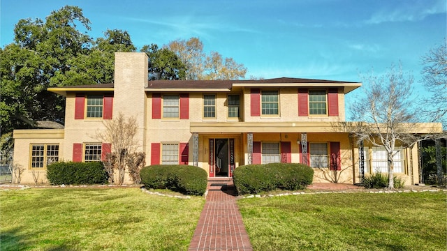 view of front facade with a front yard