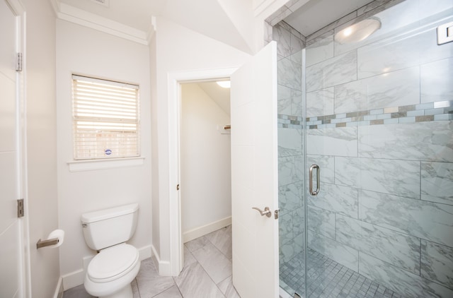 bathroom with walk in shower, ornamental molding, and toilet