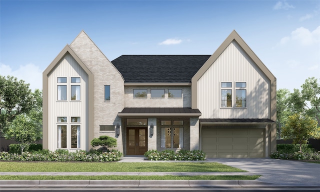 view of front facade featuring a garage, a front yard, and french doors