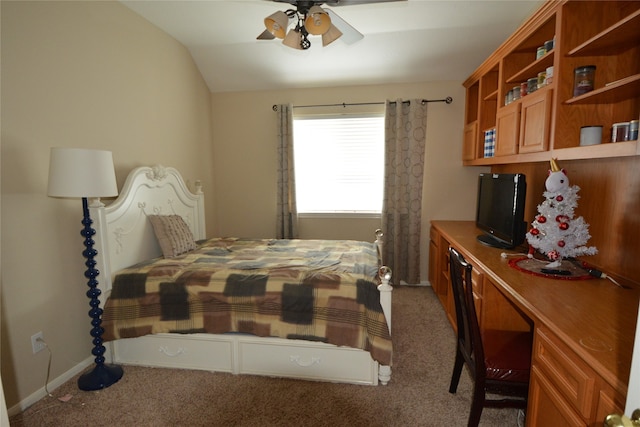 carpeted bedroom featuring vaulted ceiling and ceiling fan