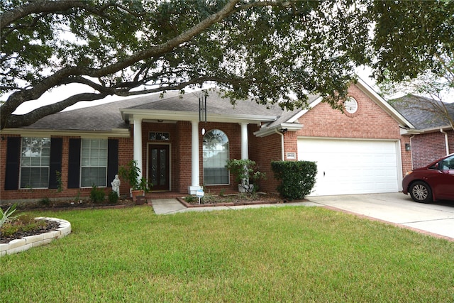 single story home featuring a garage and a front yard