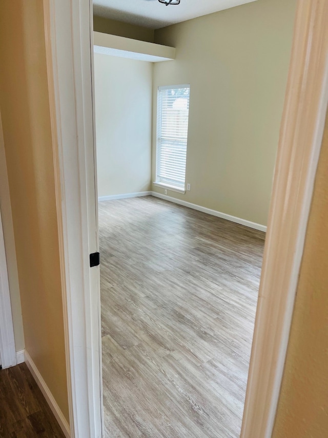 empty room featuring hardwood / wood-style floors