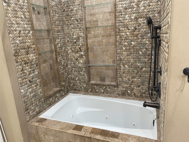 bathroom featuring tiled bath