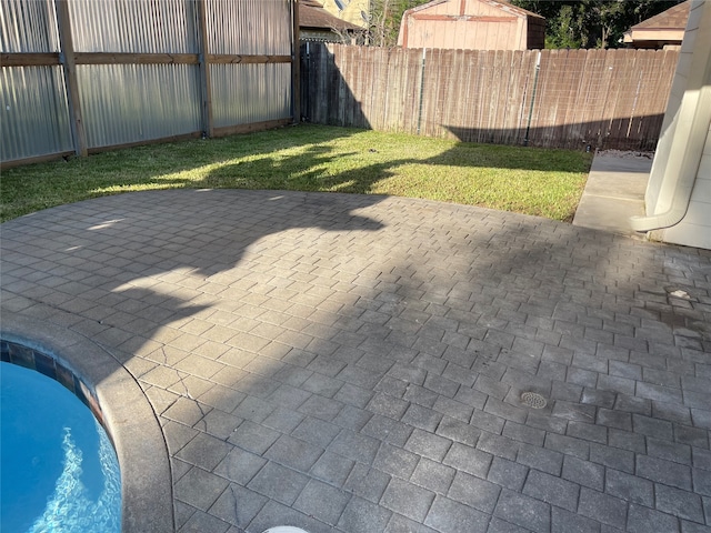 view of patio / terrace featuring a pool