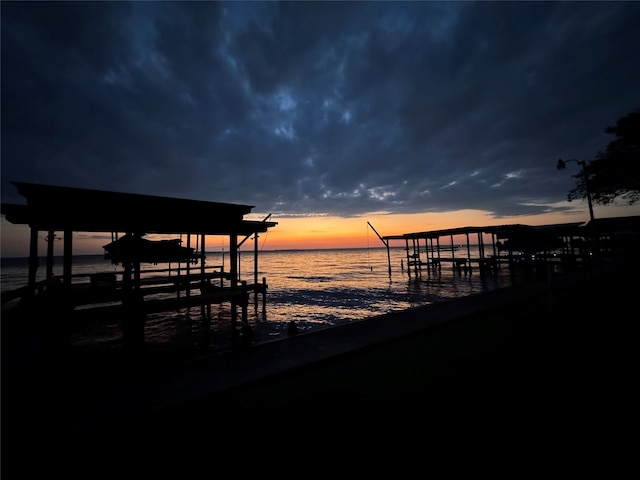 view of dock with a water view