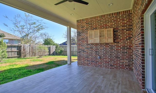 view of patio / terrace with ceiling fan and a wooden deck