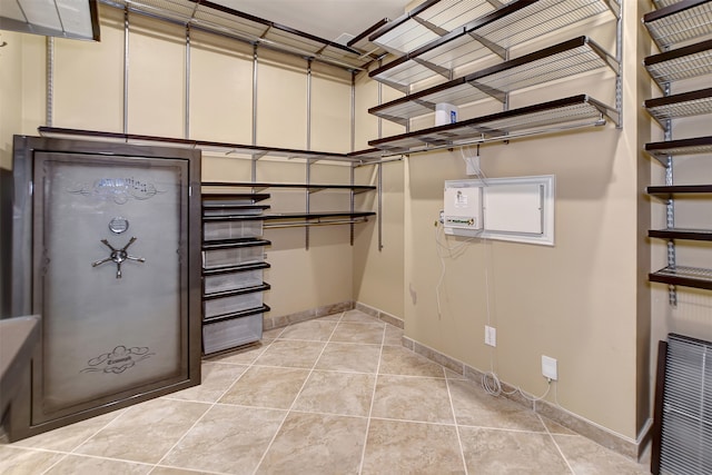 basement with light tile patterned floors