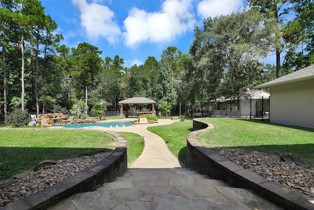 view of yard featuring a gazebo and a patio area