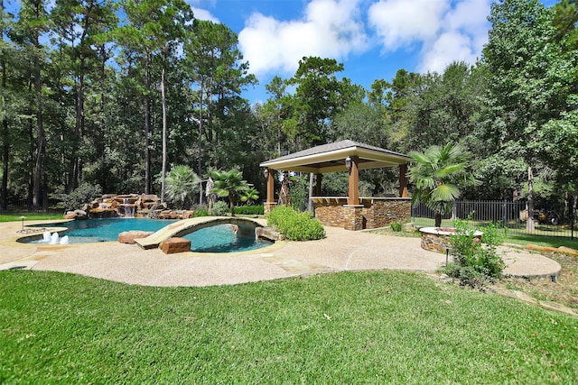 view of pool with a gazebo, a lawn, and a patio area